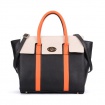 Čiernobiela kabelka s oranžovou rúčkou